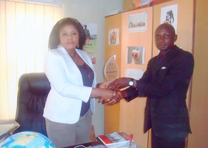 GNPAI Founder, Vera Johnson receiving a peace award for excellence in her office